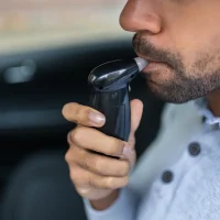 Man Taking Alcohol Test